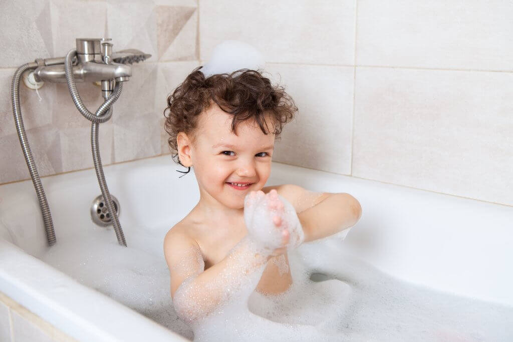 kid in bathtub